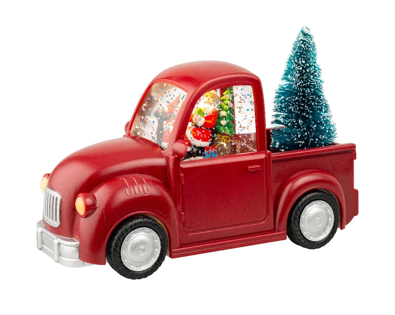 Verlichte rode auto met kerstman