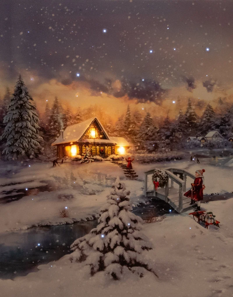 Verlichte kerstschilderij met wintertafereel, besneeuw huis en klein meisje groot