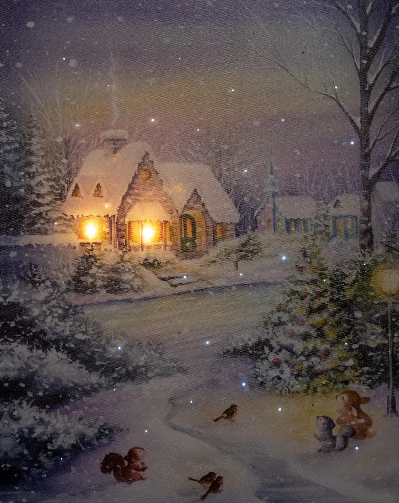 Verlichte kerstschilderij met wintertafereel en besneeuw huis groot