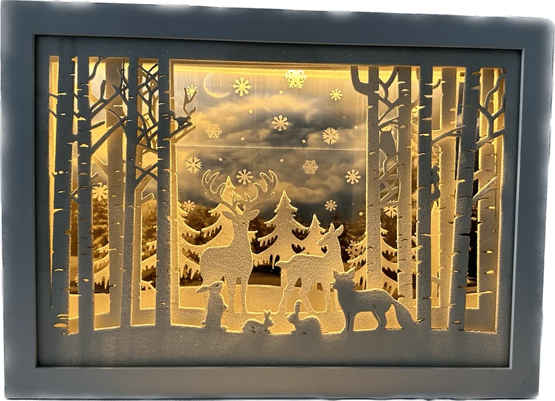 Verlicht wintertafereel in hout